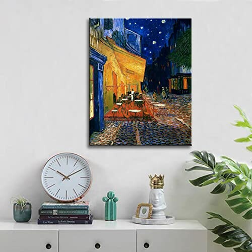 Wall art of Van Gogh's Café Terrace at Night above a clock and plants
